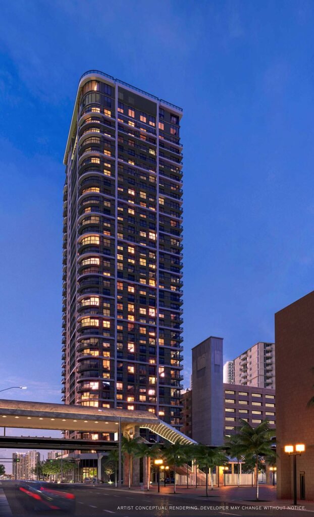 501 First Residences lit at night, seen from the south — developer rendering