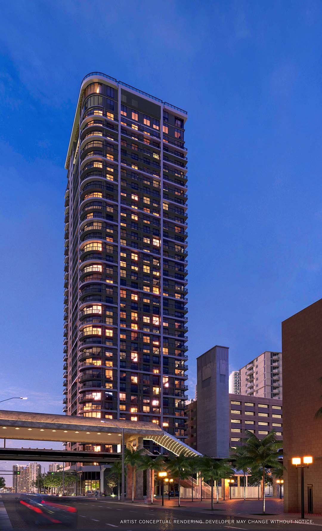 501 First Residences lit at night, seen from the south — developer rendering