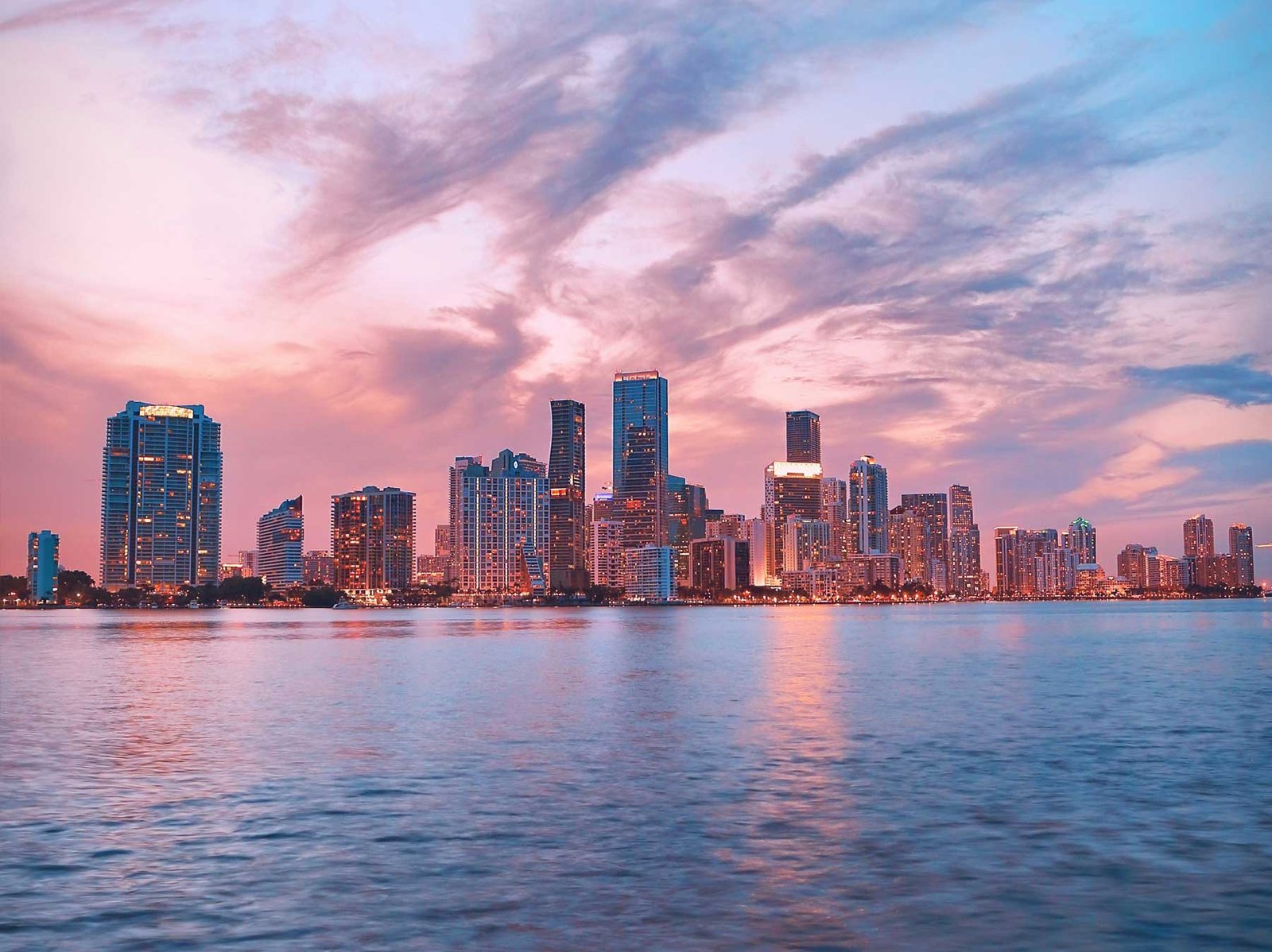 Brickell skyline at dusk seen across Biscayne Bay