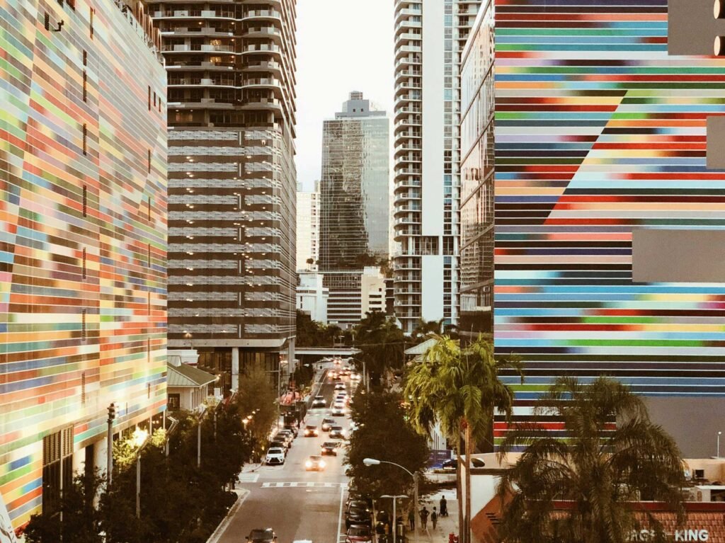 Brickell Avenue with a colourful painted tower facade above the street