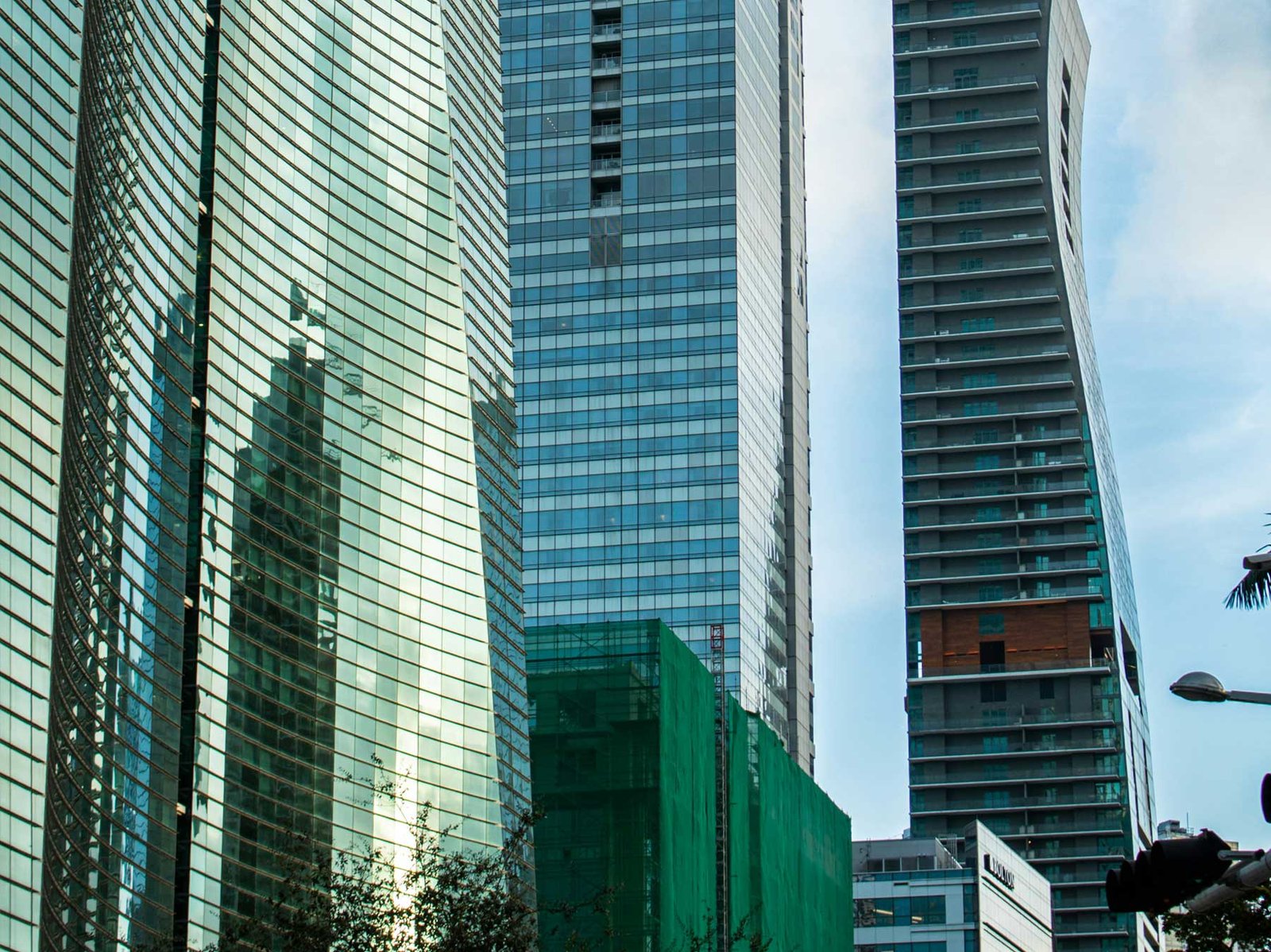 - Smart Brickell Tower A blue-green glass tower facade in Brickell — the area where Smart Brickell Tower is located