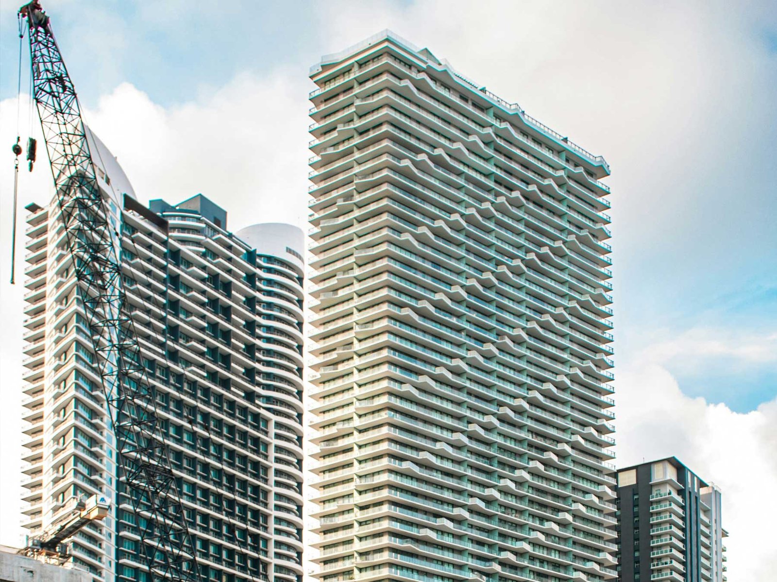 - Smart Brickell Tower A curved white condominium tower in Brickell — the area where Smart Brickell Tower is located