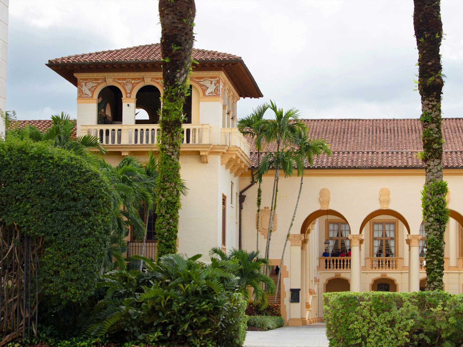 - Coral Gables Mediterranean Revival building with bell tower, arched loggia and barrel-tile roof in Coral Gables