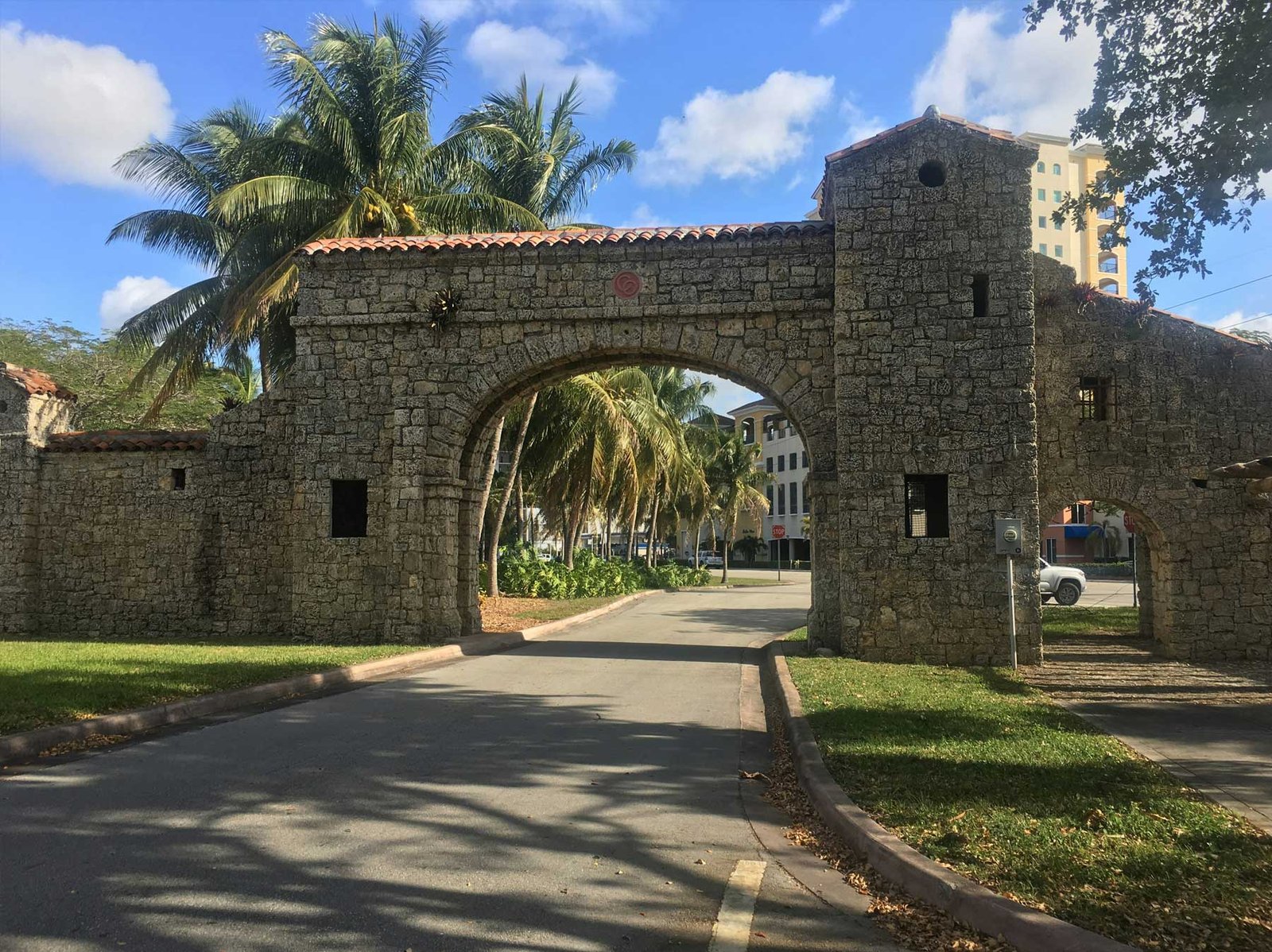 - Coral Gables Historic coral rock entrance arch spanning a road in Coral Gables