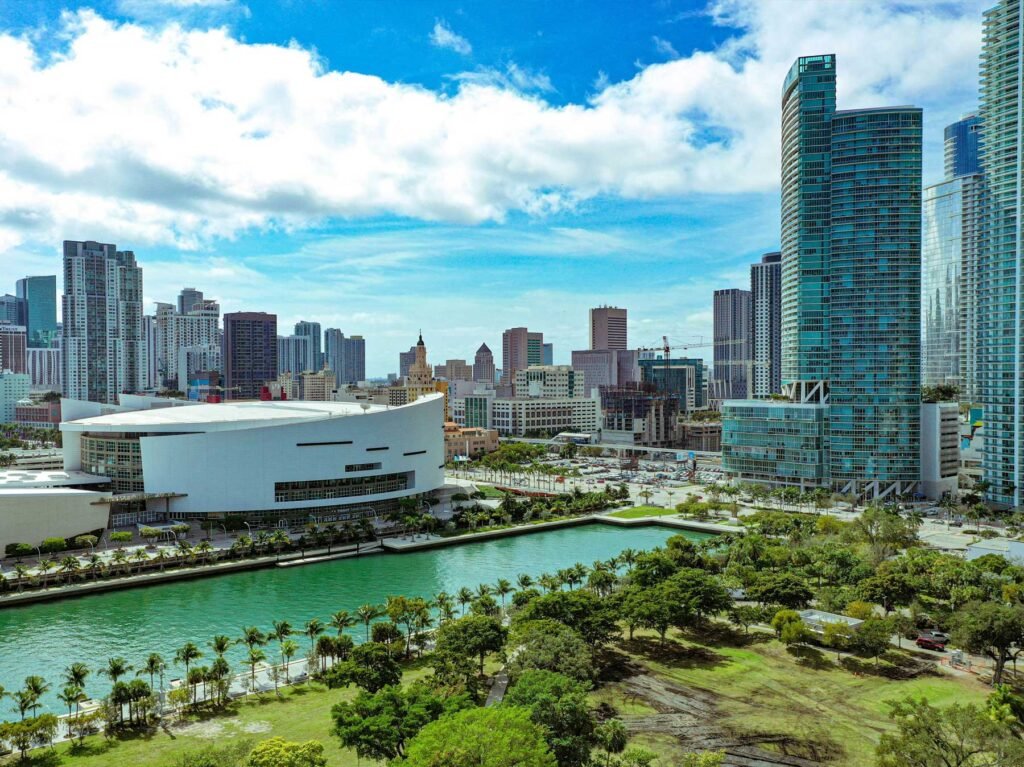 Aerial over Downtown Miami showing the bayfront arena, Museum Park and the skyline