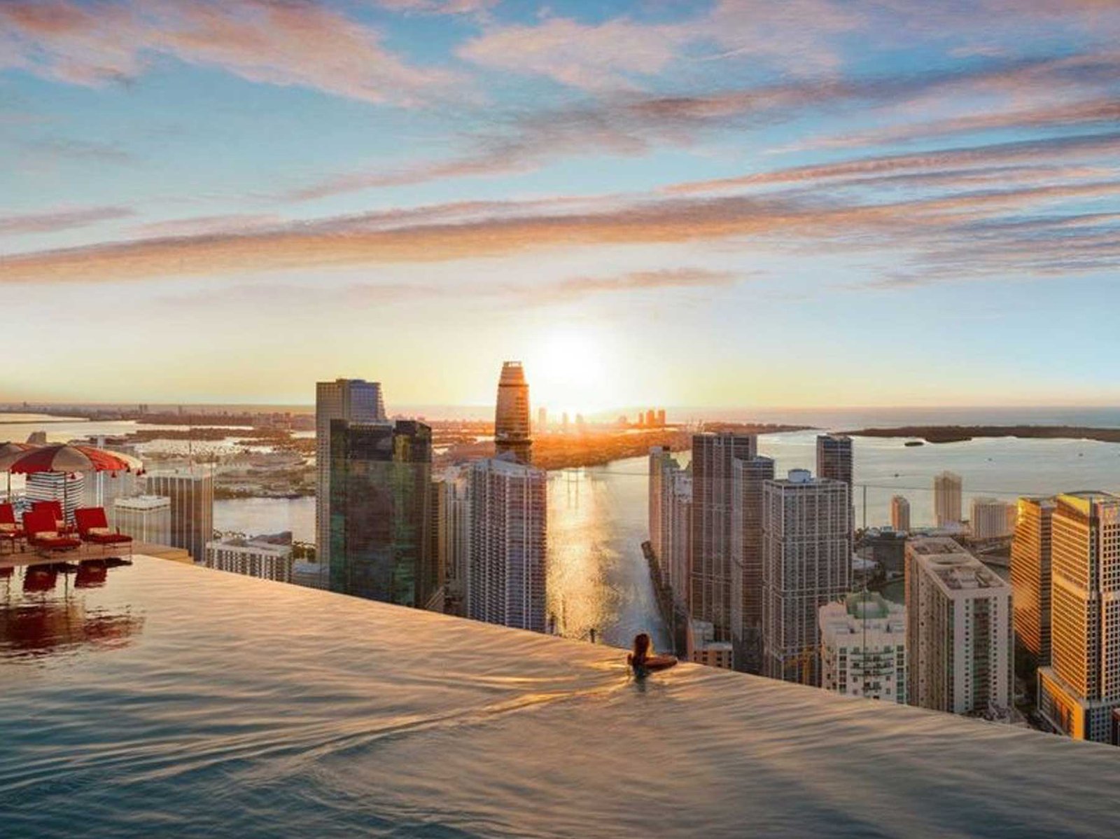- Faena Residences Miami Faena Residences Miami penthouse living room with Miami River and skyline views — developer rendering