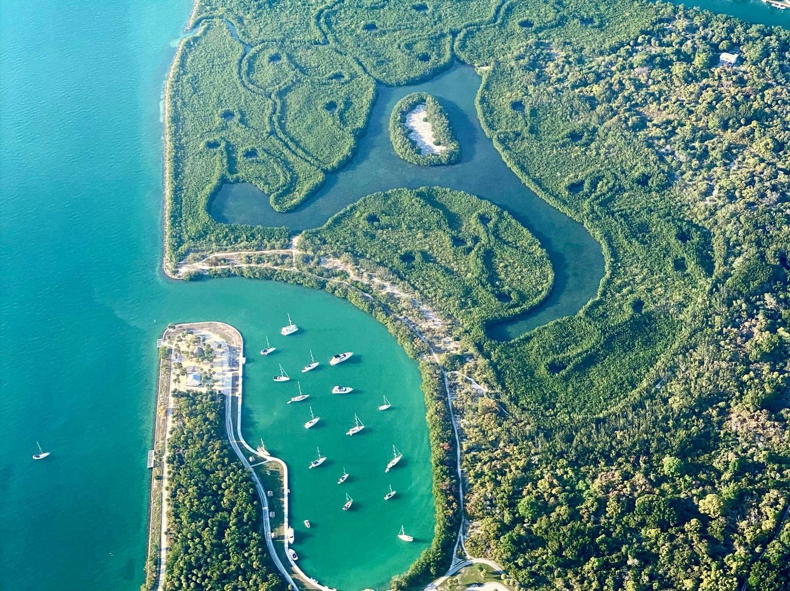 Aerial of the marina, lagoon and mangrove parkland at the south end of Key Biscayne