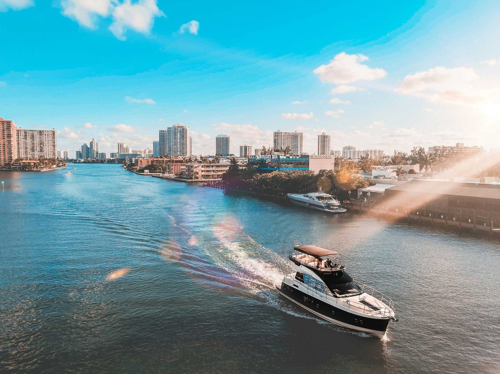 - Sell Your Miami Property Aerial of a Miami Beach waterway with marina and waterfront buildings