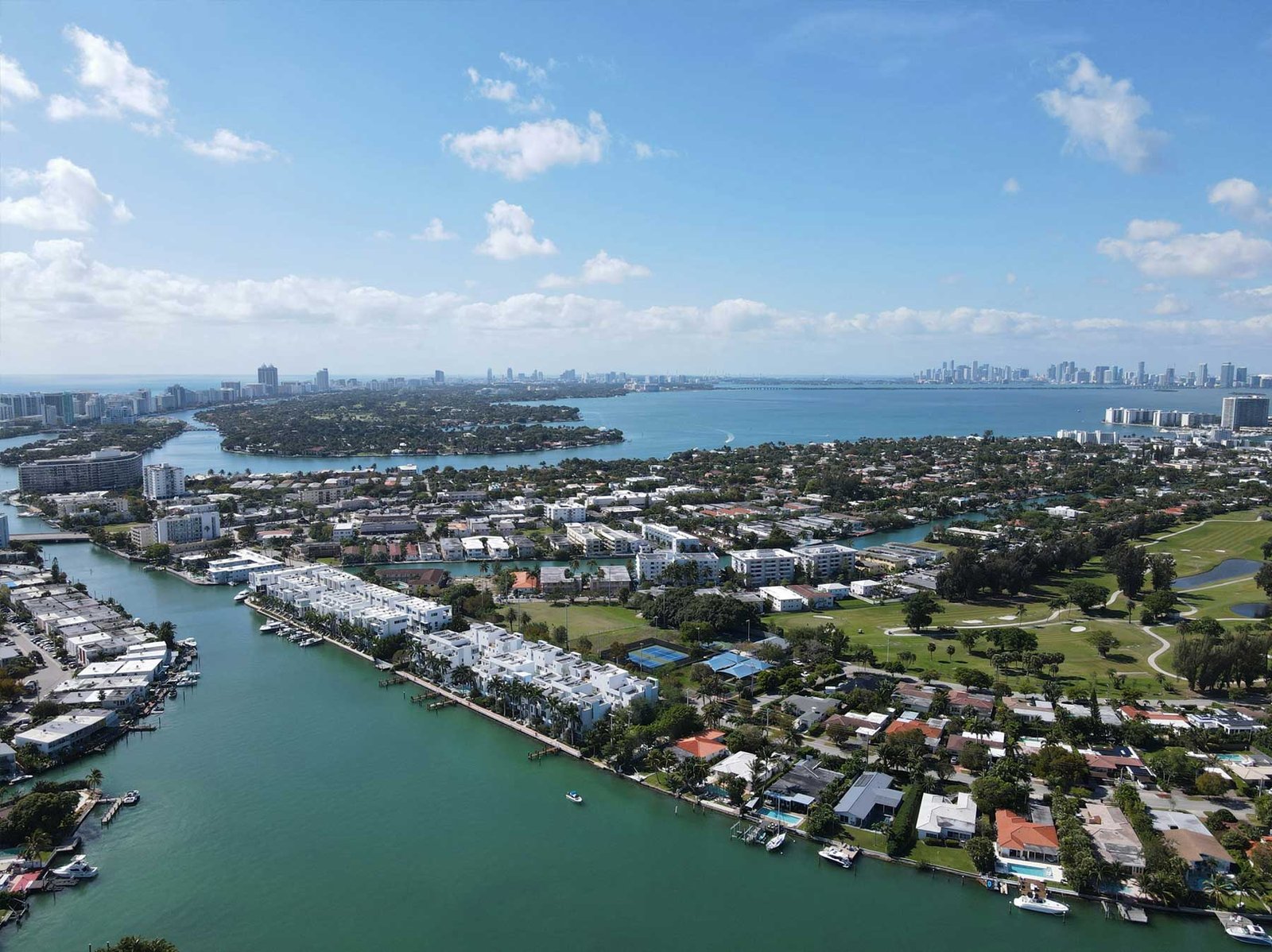 - Miami Waterfront Homes Sunset Islands bayfront estate at golden hour