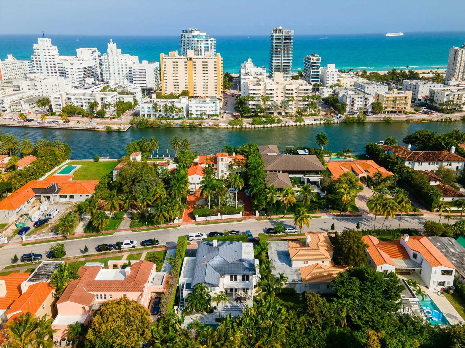 - Miami Waterfront Homes A Gables Estates waterfront mansion on a wide canal