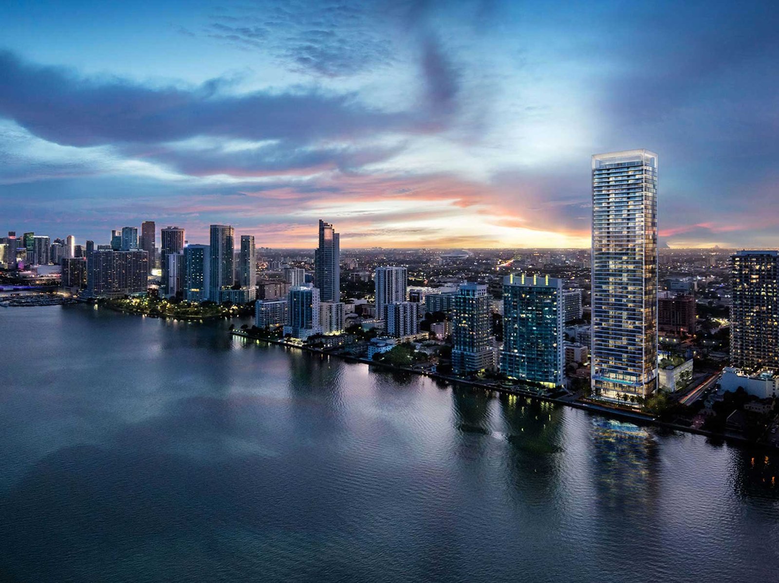 Missoni Baia in the Edgewater skyline at dusk — developer rendering