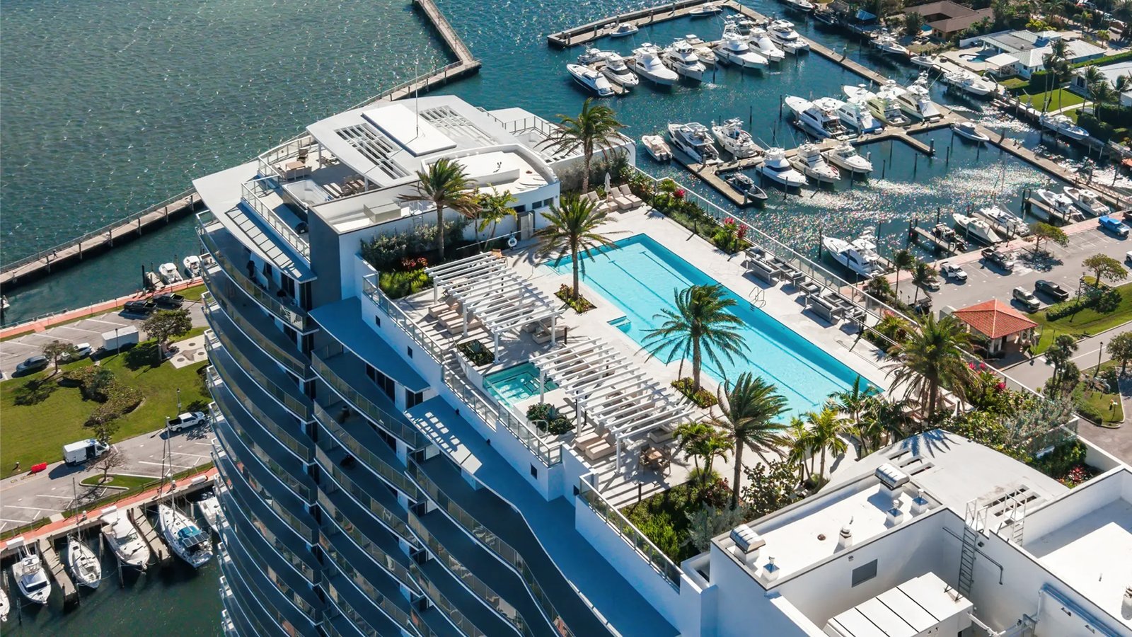 The pool deck and marina at Nautilus 220 from the air