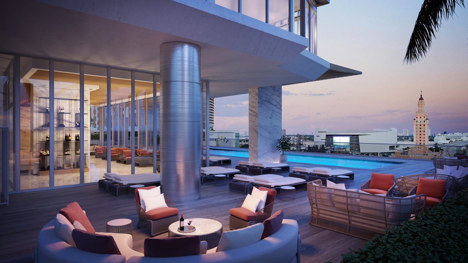 The owners pool deck with bay views and cabanas at Okan Tower