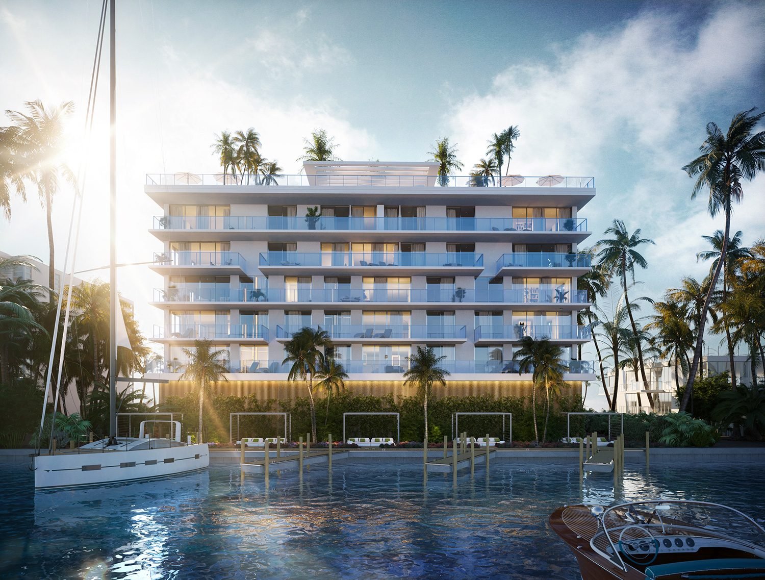 Origin Residences Bay Harbor at dusk from the waterway — developer rendering