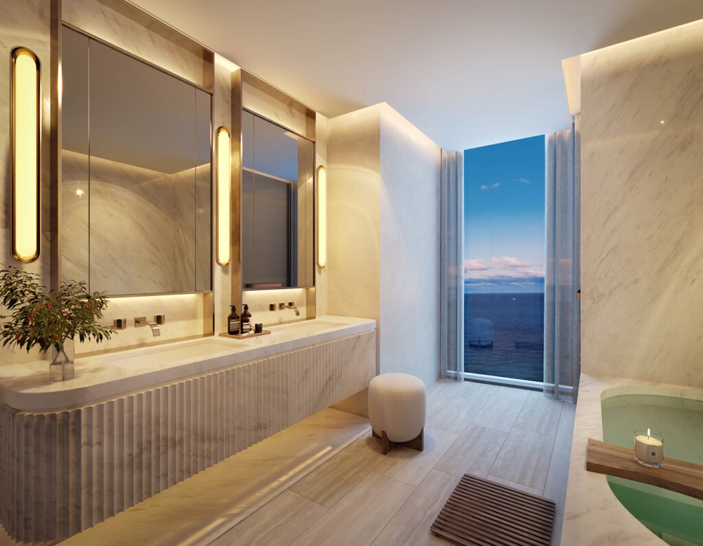 Rivage Bal Harbour primary bathroom in marble with an ocean outlook — developer rendering