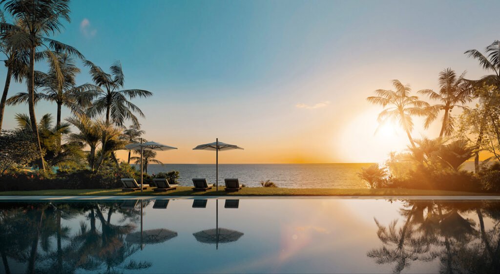 Rivage Bal Harbour pool deck at sunset — developer rendering