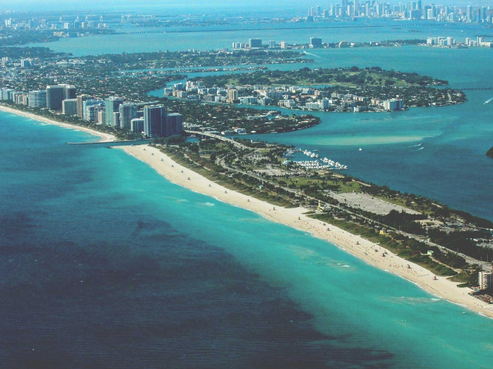 Aerial along the Sunny Isles Beach oceanfront tower strip