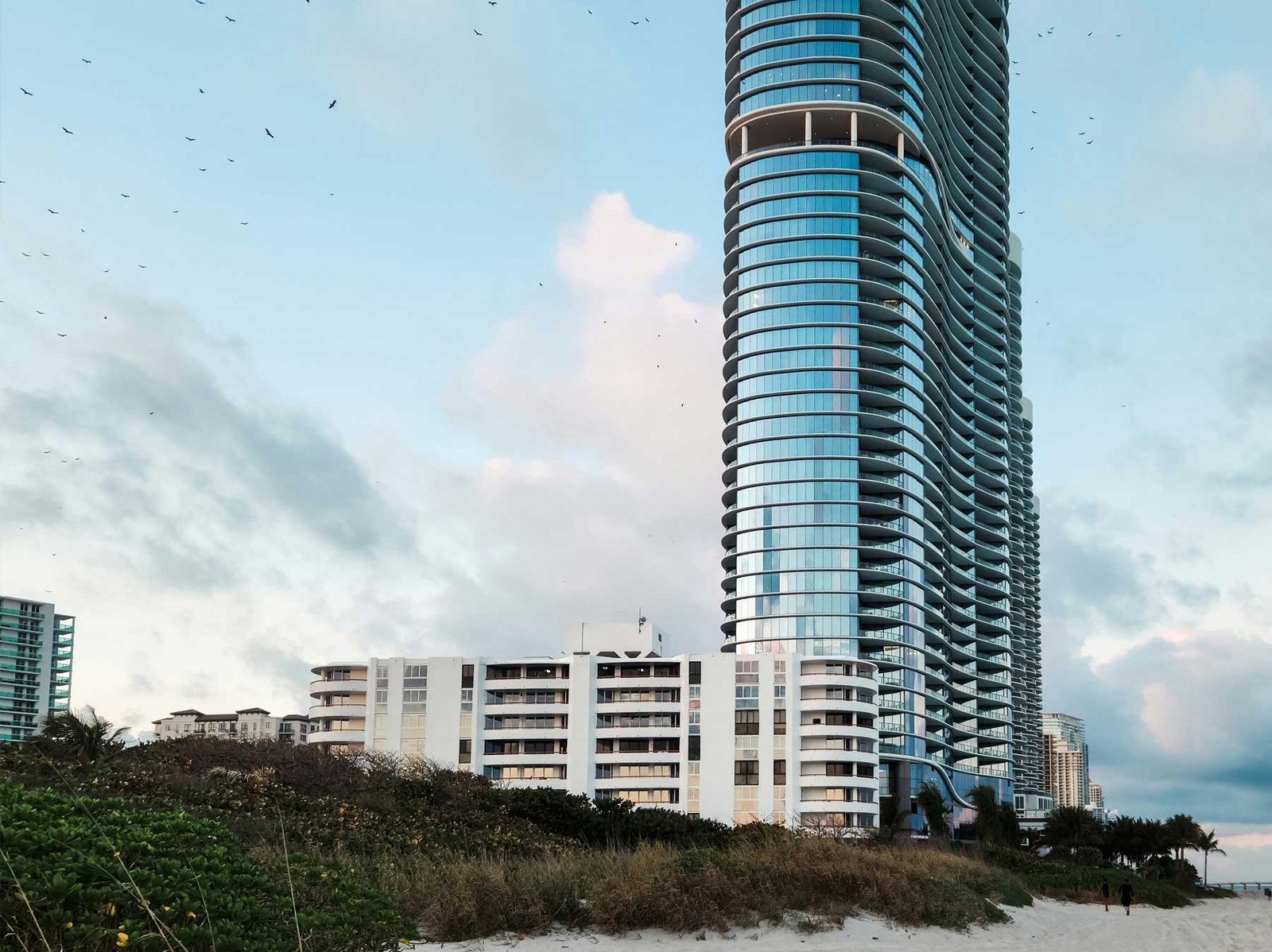 - Sunny Isles Beach Sunny Isles Beach from the sand, looking along Collins Avenue