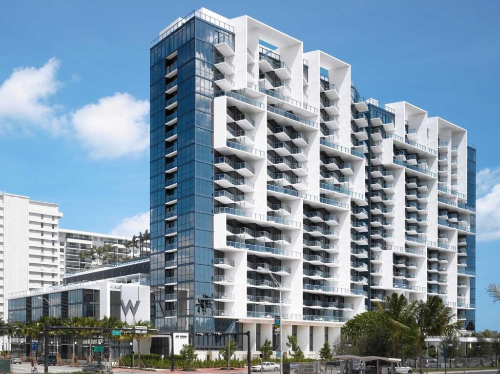 The travel press covered it as a rebrand. It is a condominium story: 173 individually owned units, fifteen months with no rental income, and a standards package nobody has priced. Miami Luxury Condos Blog
