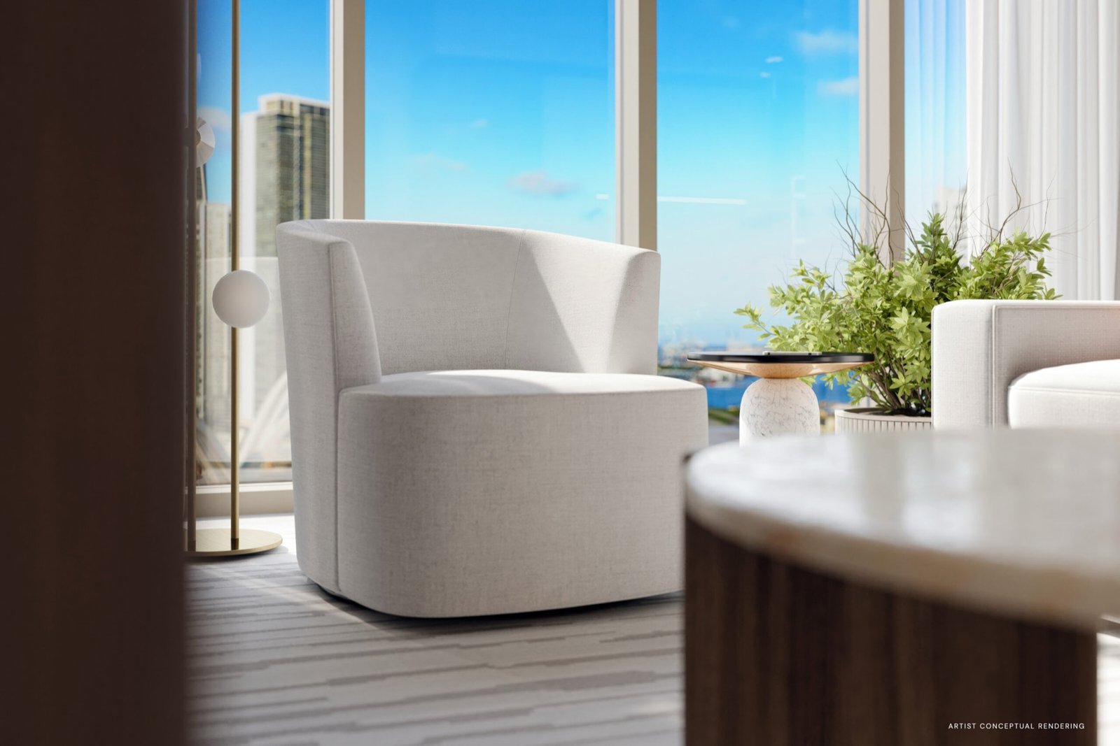 - 14 ROC Miami 14 ROC Miami — área de sala de una residencia con sillón y vista a Biscayne Bay, render del desarrollador