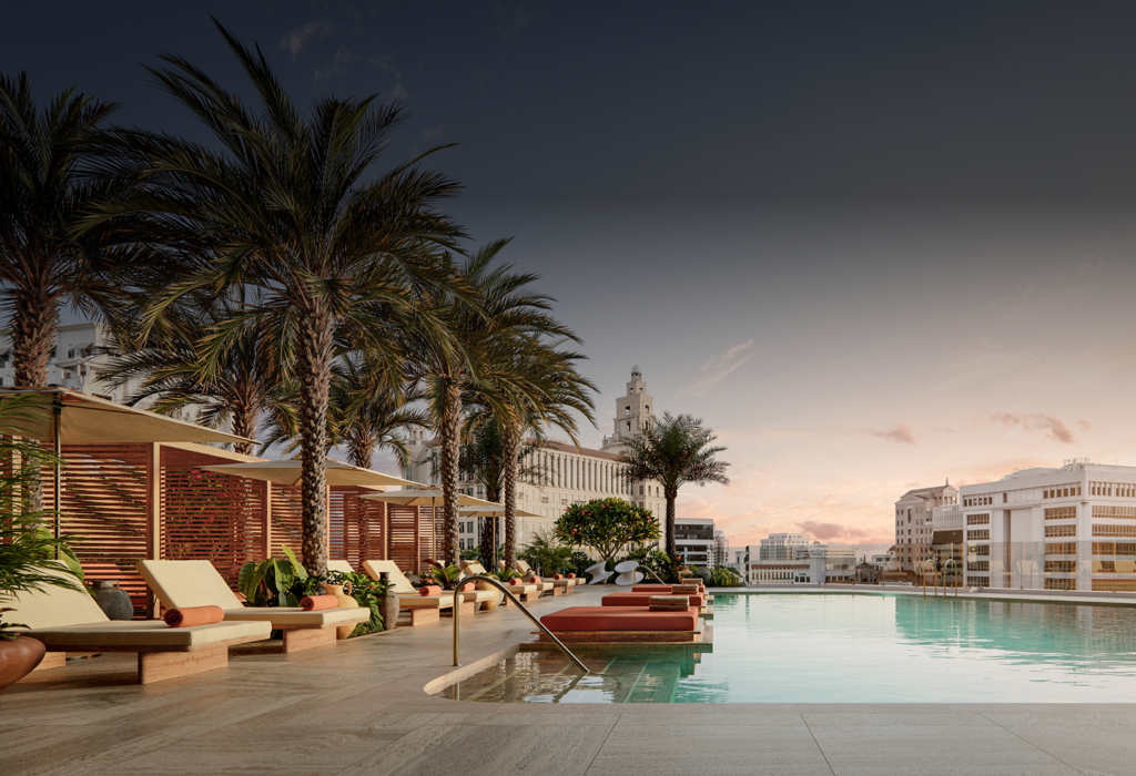 Rendering of the rooftop pool at Alhambra Parc at sunset, with the Biltmore tower beyond