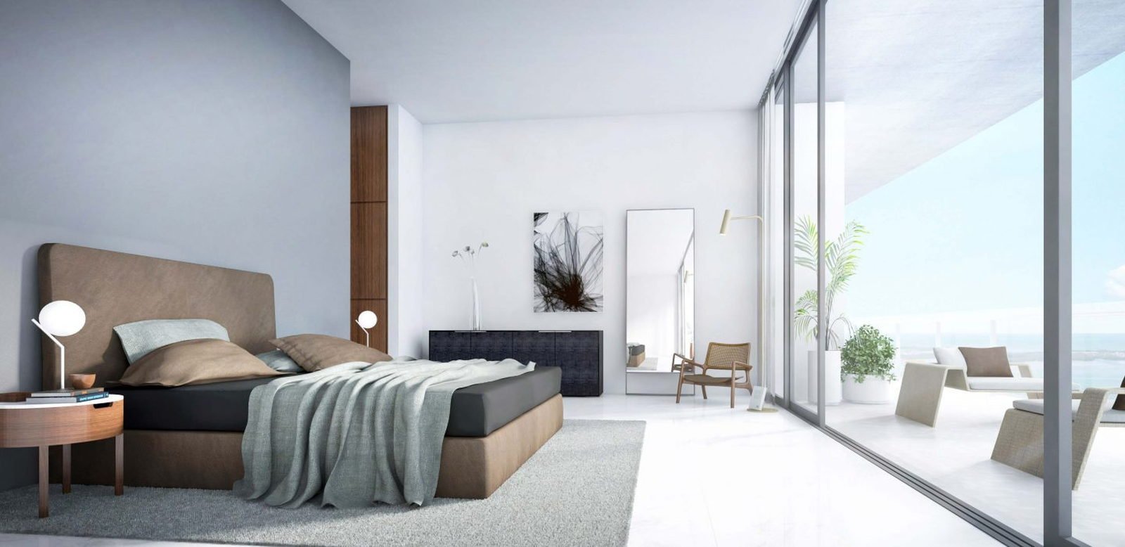 A bedroom behind full-height glass onto the water — developer rendering