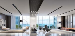 The tower lit at night and reflected in Biscayne Bay — developer rendering