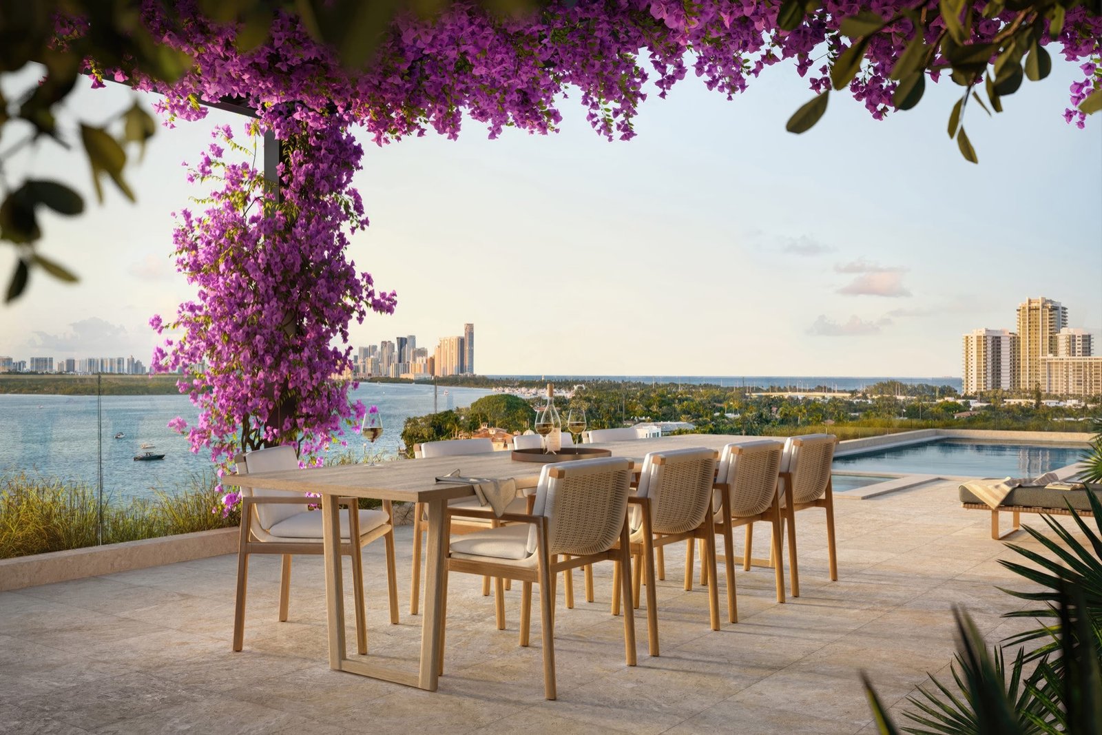 Bay Harbor Towers, Bay Harbor Islands — mesa de comedor en la terraza bajo una pérgola con flores, con alberca y vistas al agua, render del desarrollador
