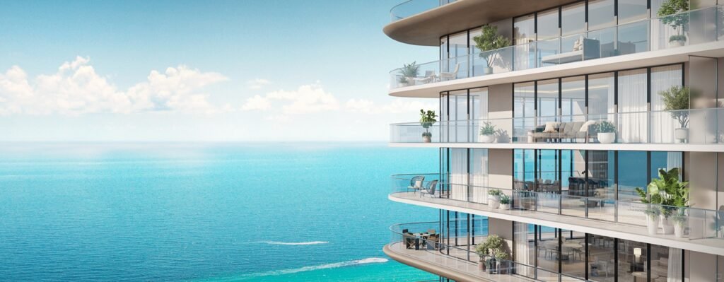 Icon Beach, Hollywood FL — angled exterior view of curved balconies over the ocean, developer rendering