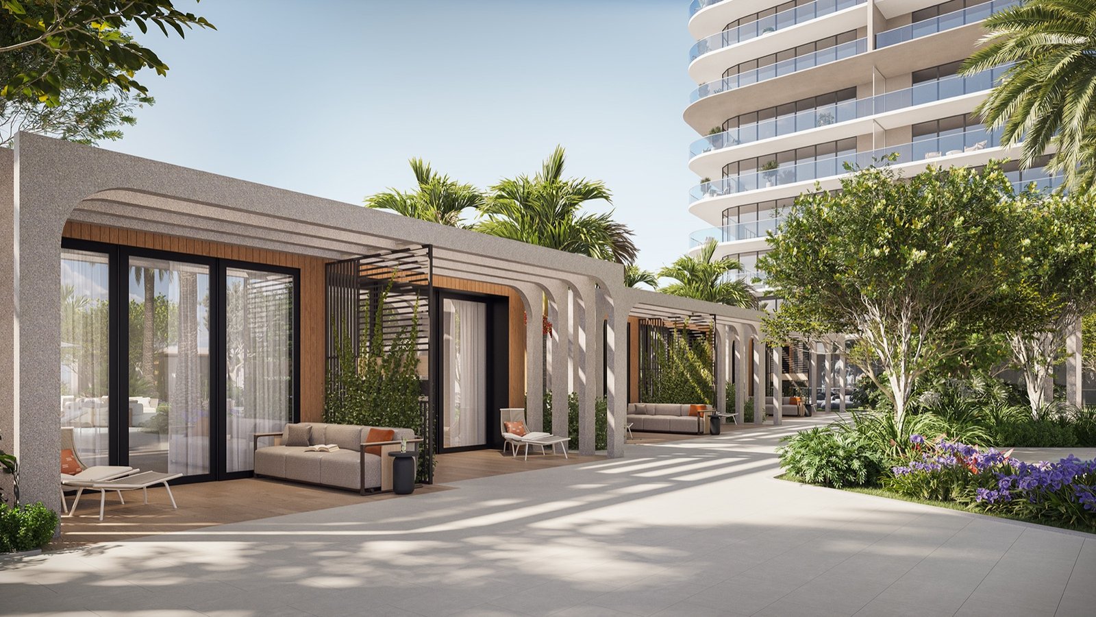 Icon Beach, Hollywood FL — andador exterior de cabañas con pérgola y paisajismo junto a la torre, render del desarrollador