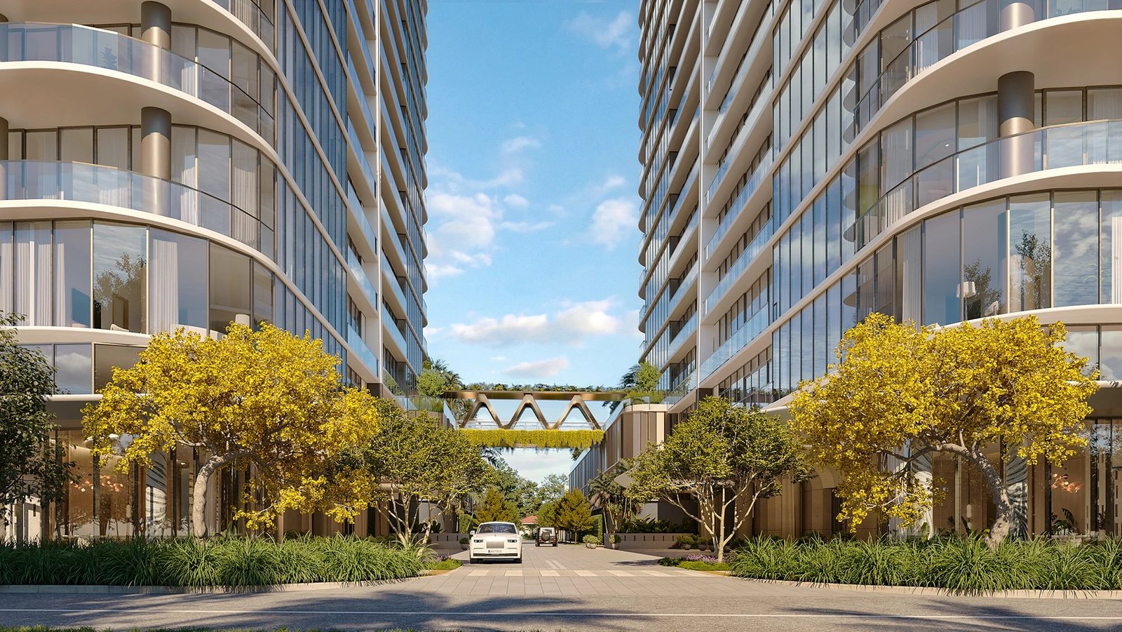 The private garden drive between the two towers at Kempinski Residences
