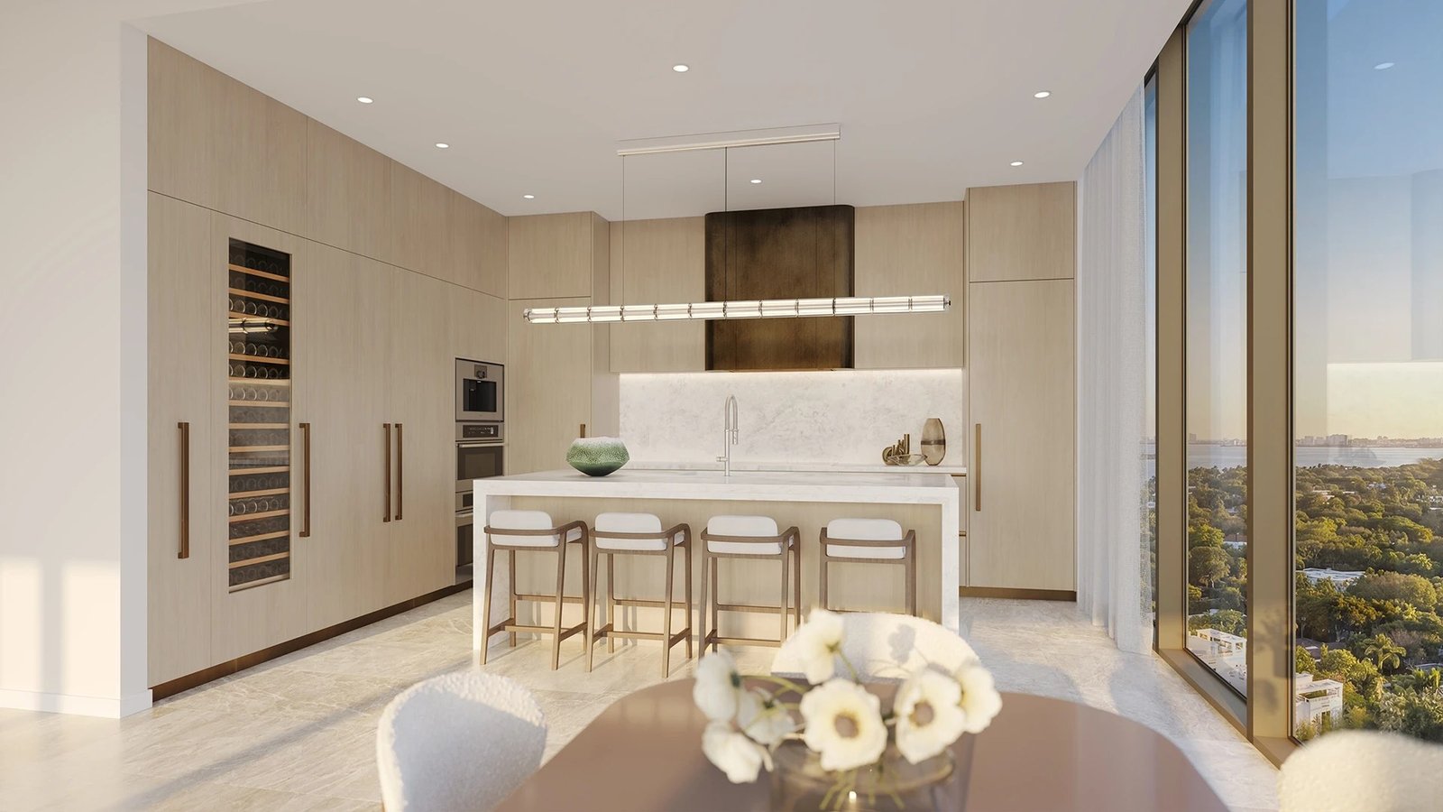 A kitchen island and bar seating at Kempinski Residences Miami Design District, developer rendering