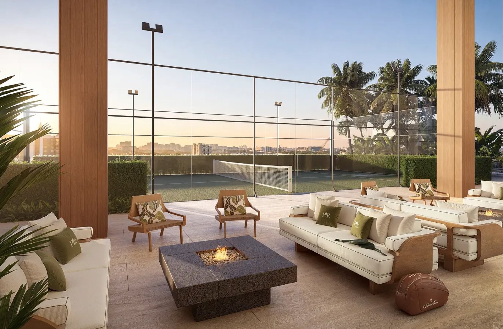 - Palm Tree Residences Miami Palm Tree Residences Miami — lounge de la cancha de pádel con cojines con el monograma de Palm Tree Residences, render del desarrollador