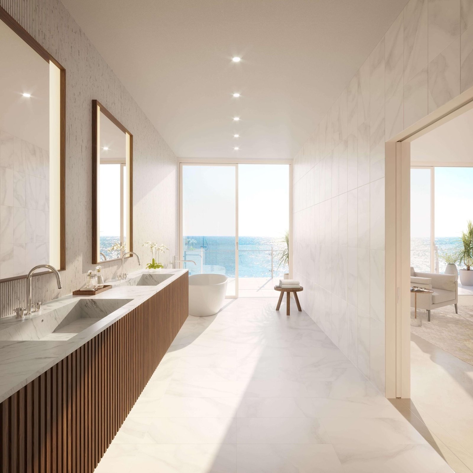 The Ritz-Carlton Residences, Pompano Beach — baño principal de una residencia de la Torre Beach con tina independiente y vista al océano