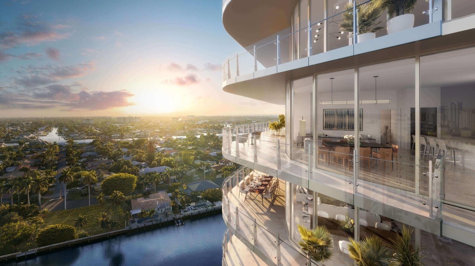 The Ritz-Carlton Residences, Pompano Beach — balcón de esquina de una residencia de la Torre Marina con vista al Intracoastal al atardecer