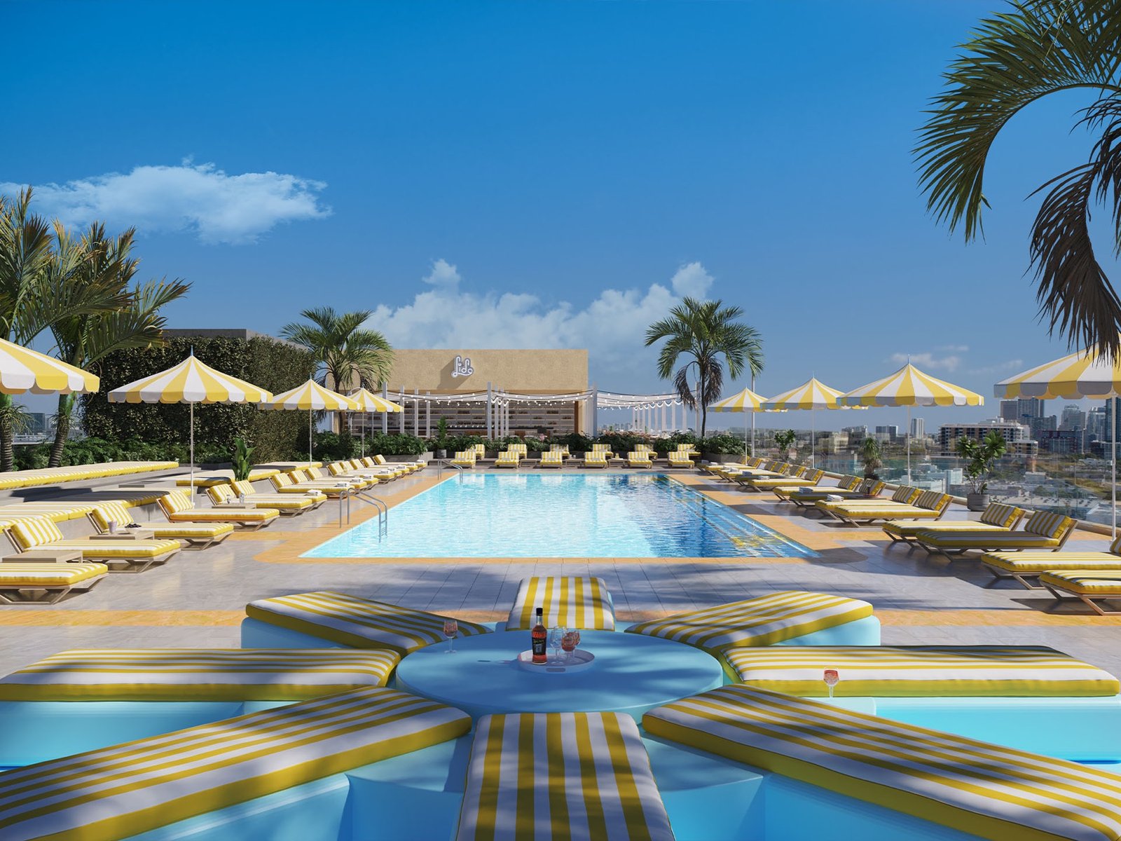 The Standard Residences, Midtown Miami — terraza de alberca Lido en la azotea con cabañas de rayas y vista al horizonte, render del desarrollador