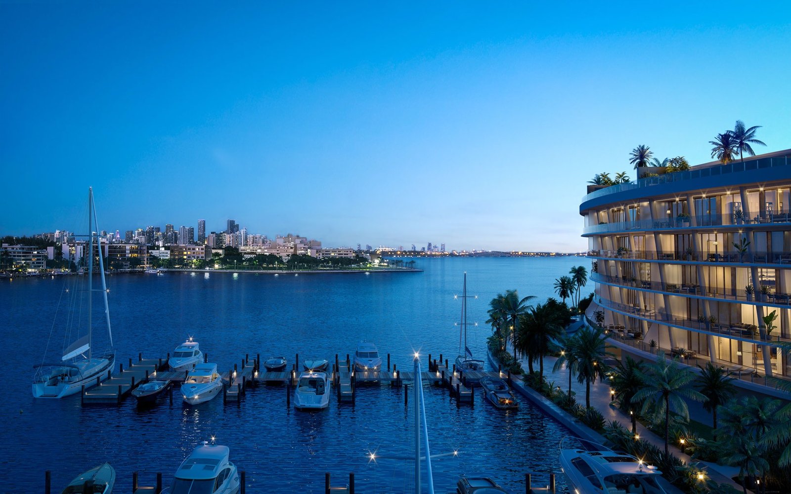Vita at Grove Isle, Coconut Grove, Miami - twilight exterior rendering overlooking the marina and Miami skyline, developer rendering